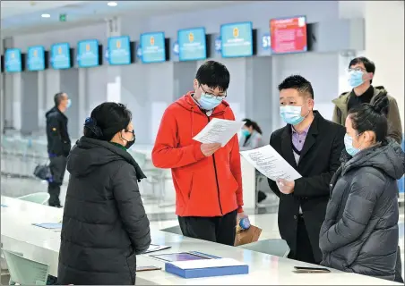  ??  ?? Clockwise from top: Job seekers consult staff members at a job fair in Hefei, Anhui province, last month.