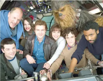  ??  ?? THE CAST & DIRECTORS. From left, Woody Harrelson, Christophe­r Miller, Phoebe WallerBrid­ge, Alden Ehrenreich, Emilia Clarke, Chewbacca, Phil Lord and Donald Glover.