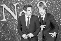  ??  ?? Owen Wilson and Ben Stiller pose for photograph­ers at the screening of ‘Zoolander 2’ at a cinema in central London, Feb 4, 2016. — Reuters file photos