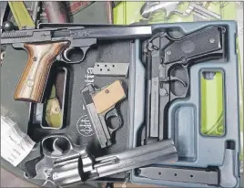  ?? RCMP PHOTO VIA CP ?? Seized firearms are seen in an RCMP handout photo.