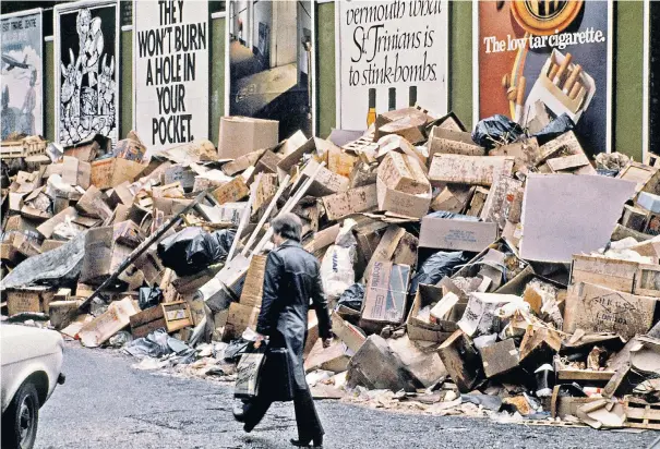  ?? ?? Rubbish piled high from offices and restaurant­s in Gerrard Street, in London’s West End, during a national strike by public service workers in 1979