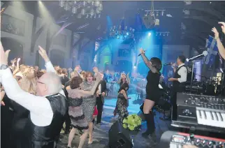  ?? PHOTOS: INTERNATIO­NAL PHOTO IMAGING ?? The Director’s Showband unleashes the steamy green dance machine at the annual St. Pat’s Charity Ball.