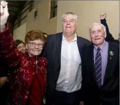  ??  ?? Johnny Mythen celebrates with his parents, Jim and Kathleen.