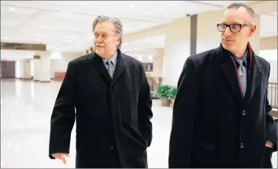  ?? AP PHOTO ?? Former White House strategist Steve Bannon (left) leaves a House Intelligen­ce Committee meeting where he was interviewe­d behind closed doors in Washington Tuesday.