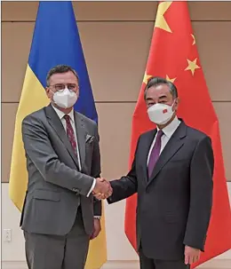  ?? Foreign Affairs of China Photo: Ministry of ?? Chinese State Councilor and Foreign Minister Wang Yi meets Ukrainian Foreign Minister Dmytro Kuleba on September 22, on the sidelines of the UN General Assembly.