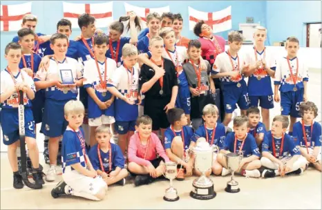  ??  ?? Herne Bay Roller Hockey Club show off the trophies they won at finals day