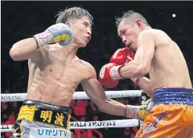  ??  ?? Naoya Inoue, left, in action against Nonito Donaire in Saitama.