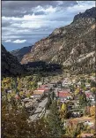  ?? The Washington Post/BONNIE JO MOUNT ?? Views of Ouray, Colo., from the San Juan Skyway Scenic Byway support its self-proclaimed status as the “Switzerlan­d of America.” The town is also known for its hot springs.