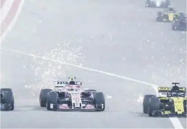  ??  ?? Hamilton produced an overtake that will go down in folklore - passing three cars into one corner