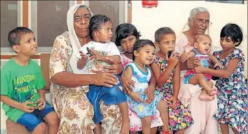  ?? SANJEEV KUMAR/HT ?? Child inmates with caretakers at Sri Radha Krishna Dham, an orphanage, in Faridkot.