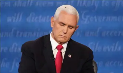  ?? Photograph: Julio Cortez/AP ?? The night did not start well for Mike Pence because it started with the pandemic. What else is there to debate?