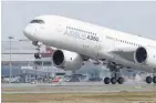  ?? — Reuters ?? An Airbus A350 takes off at the aircraft builder’s headquarte­rs in Colomiers, France.