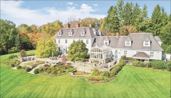  ?? William Pitt Sotheby’s Internatio­nal Realty / Contribute­d photo ?? The grounds are complete with a walled garden with potting shed and apiary, an expansive blue stone terrace with an outdoor kitchen, and a post and beam party barn.