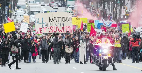  ?? NICK PROCAYLO/PNG ?? Georgia Street was blocked during an Indigenous-led march in Vancouver Tuesday. The gathering was in support of the Wet’suwet’en, who have set up a camp in opposition to the Coastal GasLink pipeline.