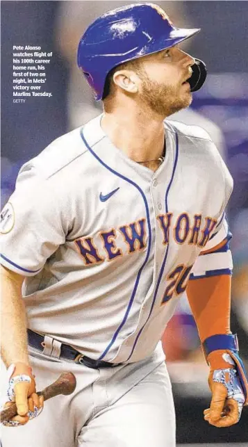  ?? GETTY ?? Pete Alonso watches flight of his 100th career home run, his first of two on night, in Mets’ victory over Marlins Tuesday.