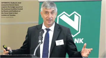  ?? Picture: ALAN EASON ?? OPTIMISTIC: Nedbank chief economist Dennis Dykes unpacks the budget speech at the business breakfast hosted by Mazars and Nedbank at the Osner Hotel in East London on Tuesday.