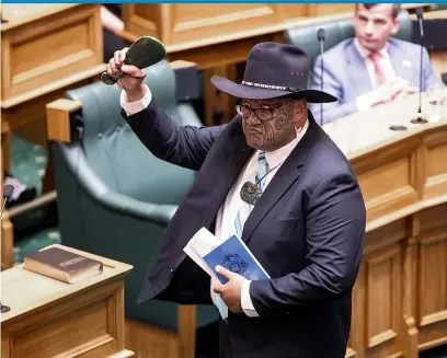  ?? ROBERT KITCHIN/STUFF ?? Above, Ma¯ori Party co-leader Rawiri Waititi moments before swearing the Oath of Allegiance yesterday. Below, Labour MP Arena Williams is sworn in at Parliament.