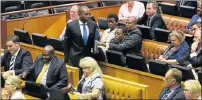  ??  ?? WALK OUT: DA leader Mmusi Maimane walks out of parliament after being ordered by the Speaker to leave Picture: ESA ALEXANDER