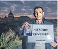  ?? ?? Francesco Zanardi, an Italian abuse victim, holds up his message to Pope Francis