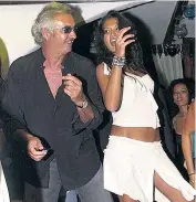 ??  ?? LAP DANCE: Goga Ashkenazi dances with F1 tycoon Flavio Briatore