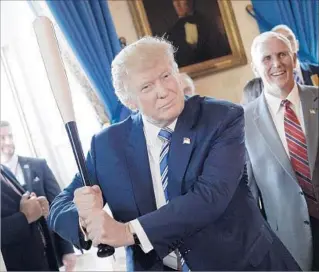  ?? Olivier Douliery AFP/Getty Images ?? IF IT WERE Alt-Right Night at Dodger Stadium, would the president throw out the first ball?