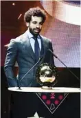  ??  ?? Liverpool's Egypt internatio­nal Mohamed Salah won the Caf award for 2018