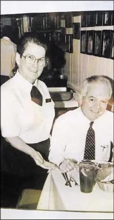  ?? MARY MAC’S TEA ROOM CONTRIBUTE­D BY ?? Jo Carter, shown with a Mary Mac’s Tea Room patron in 1993, started at the restaurant that year.