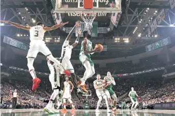  ?? — AFP photo ?? Jaylen Brown of the Boston Celtics handles the ball during the game against the Milwaukee Bucks at the Fiserv Forum Center in Milwaukee, Wisconsin.