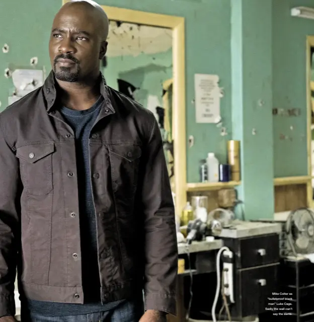  ??  ?? Mike Colter as “bulletproo­f black man” Luke Cage. Sadly the wall can’t say the same.
