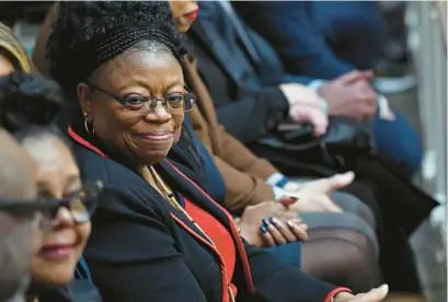  ?? KIM HAIRSTON/BALTIMORE SUN ?? Gov. Wes Moore’s mother, Joy Moore, attends her son’s first State of the State address on Feb. 1. After the death of her husband, Moore worked multiple jobs to provide for her three children.