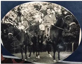  ??  ?? Anne and Sid McMath take their children on a horseback ride near their Hot Springs area home in 1947. Sandy shares a horse with his father, Phillip rides with his mother.
(Courtesy of Phillip H. McMath)