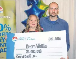  ?? COLIN FARRELL/THE SOUTHERN GAZETTE ?? Bram Whittle of Grand Bank is the province’s newest millionair­e. Whittle was one of two Maxmillion winners in the province for the Oct. 19 Lotto Max draw. Whittle was joined during the presentati­on by his fiancée, Colleen Cumben, their two children and other family members.