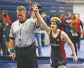  ?? AP PHOTO ?? Euless Trinity’s Mack Beggs is announced as the winner of a semifinal match in Allen, Texas. Beggs, a transgende­r boy who won a girls wrestling state title in Texas, says he would compete against boys if allowed and is taking lower doses of...