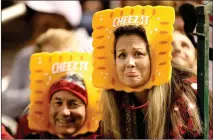  ?? Christian Petersen / Getty Images /TNS ?? Fans reacts during the second half of the Cheez-it Bowl between the Air Force Falcons and Washington State Cougars on Dec. 27, 2019, at Chase Field in Phoenix, Arizona.the University of Miami will face Oklahoma State in the Cheez-it Bowl on Dec. 29.