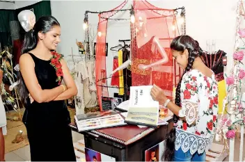  ??  ?? Undergradu­ates specialisi­ng in fashion design and product developmen­t at the Department of Textile and Apparel Technology of the Open University this week conducted an exhibition at the JDA Perera Gallery of the Faculty of Visual Arts in Colombo. A...