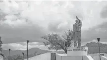  ?? Marie D. De Jesús / Houston Chronicle ?? In Salcajá, Guatemala, a statue facing north honors the emigrants in the U.S. who send “remesas” or remittance­s to their families.