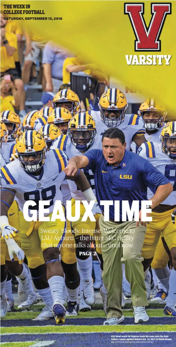  ?? [MATTHEW HINTON/THE ASSOCIATED PRESS] ?? LSU head coach Ed Orgeron leads his team onto the field before a game against Auburn Oct. 14, 2017, in Baton Rouge, La.