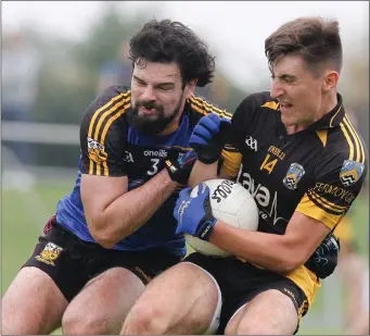  ??  ?? Fermoy’s David Lardner gets ahead of Buttevant’s Michael Broe to win possession during last weekend’s Synergy Credit Union Junior A Football Championsh­ip game in Castletown­roche.