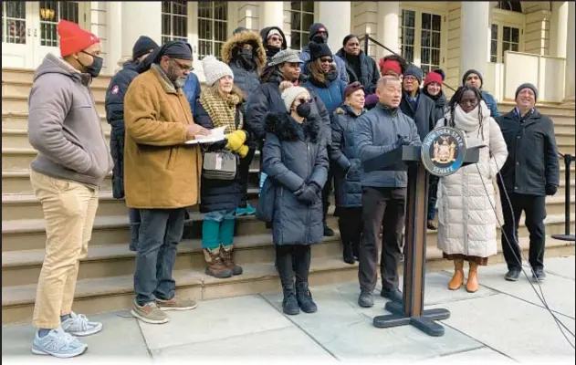  ?? ?? State senators brave frigid weather Friday, gathering at City Hall to protest plan in Gov. Hochul’s budget to increase the number of charter schools in the city. City Comptrolle­r Brad Lander (below) is also against the proposal.