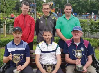  ??  ?? At the presentati­on of prizes for the County Pitch & Putt Strokeplay Championsh­ips last Sunday in Listowel are, seated l-r: Richard Bunyan (Listowel, Intermedia­te winner), Declan McCarron (Listowel, Senior winner) and Fergus Keane (Listowel, Junior...