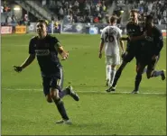  ?? MIKEY REEVES — FOR MEDIANEWS GROUP ?? Union captain Alejandro Bedoya, left, here celebratin­g a goal from another game, had a message for Congress on national TV Sunday night.