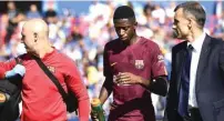  ?? PIERRE-PHILIPPE MARCOU/AFP PHOTO ?? JANGAN DIPAKSAKAN: Ousmane Dembele (tengah) saat mengalami cedera hamstring pada laga melawan Getafe (16/9).