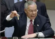  ?? ?? A ‘BLOT’: Powell presents the case at the United Nations in February 2003 supporting claims that Iraq was developing weapons of mass destructio­n --- claims that were later proven false.