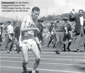  ??  ?? Exhausted As Jim Peters staggered to line in the 1954 Empire Games, he was overtaken by Joe McGhee
