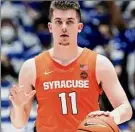  ?? Gerry Broome / Associated Press ?? Syracuse guard Joseph Girard III had 15 points, two steals, four assists and three rebounds against Louisville on Saturday.