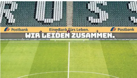  ?? FOTO: IMAGO IMAGES ?? Im leeren Stadion in Mönchengla­dbach steht vor dem Geisterspi­el gegen den 1. FC Köln „Wir leiden zusammen“auf der Werbebande.