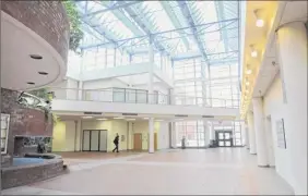  ?? Lori Van Buren / times union archive ?? the interior of troy’s Atrium mall in 2015. the public is invited to a workshop about the future of the farmers market on Wednesday.