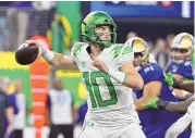  ?? DAVID BECKER / ASSOCIATED PRESS ?? The Denver Broncos drafted former Oregon quarterbac­k Bo Nix with the 12th pick in the NFL draft on Thursday.