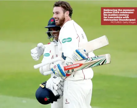  ?? PICTURES: Getty Images ?? Embracing the moment: Jordan Clark celebrates his maiden century for Lancashire with Shivnarine Chanderpau­l