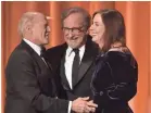  ??  ?? Frank Marshall, left, Steven Spielberg and Kathleen Kennedy were given the Irving G. Thalberg Memorial Award.